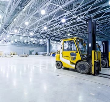 High racking stacked with pallets inside a warehouse